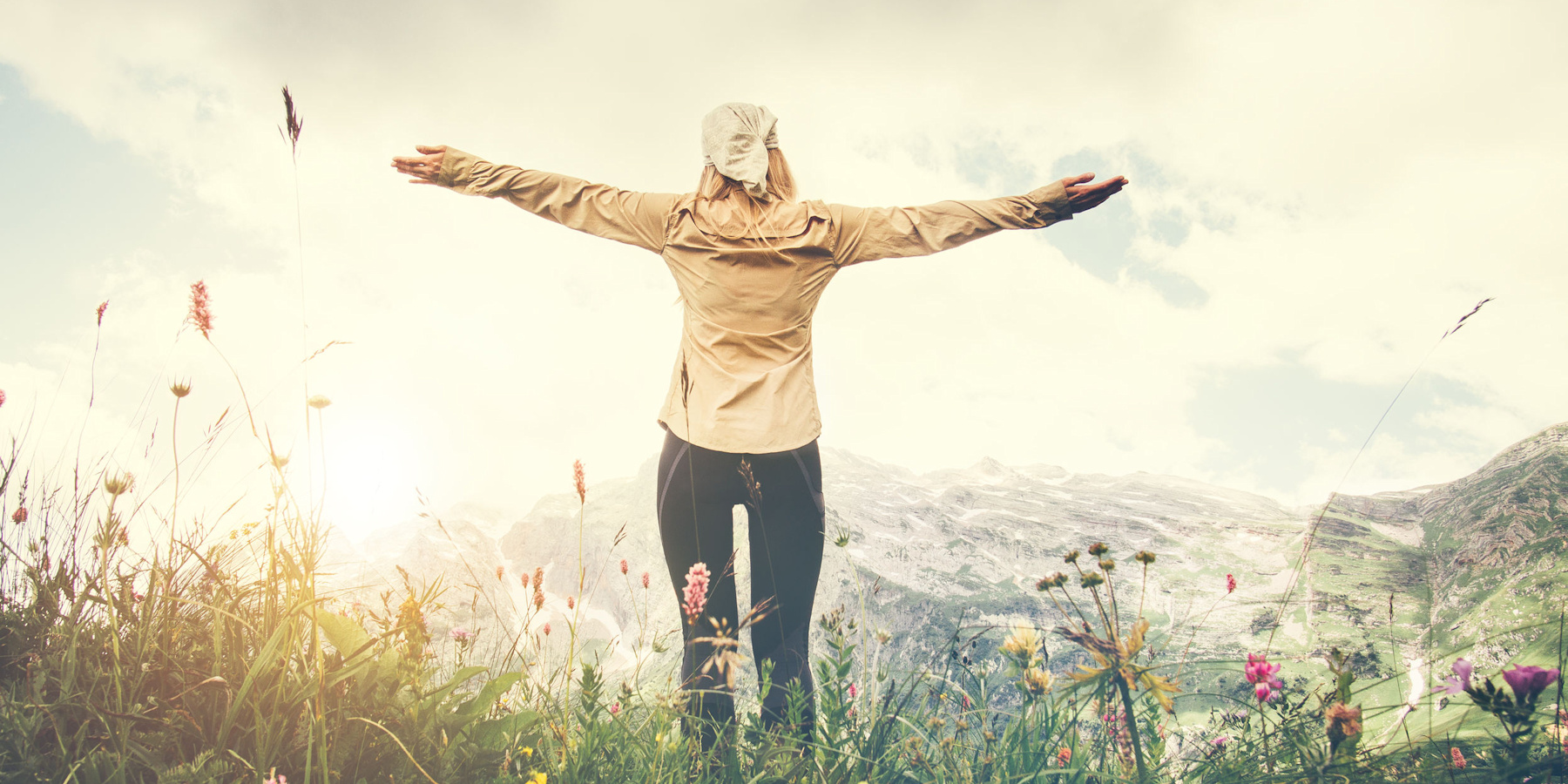 Woman with outstretched arms.