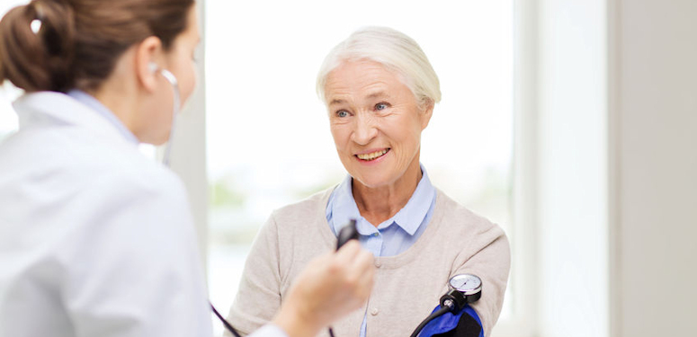 Patient having her blood pressure taken.
